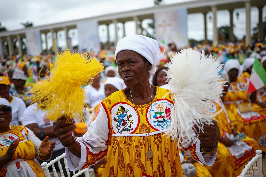 A woman cheers as the crowd waits for the arrival of Pope Leo XIV to celebrate Mass at the Basilica of the Immaculate Conception in Mongomo, Equatorial Guinea, April 22, 2026. (OSV News photo/Guglielmo Mangiapane, Reuters)