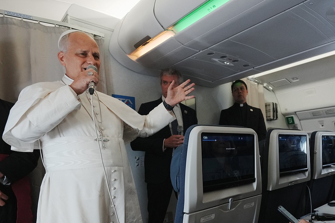 Pope Leo XIV speaks to journalists aboard a flight returning to Rome April 23, 2026, at the conclusion of his 11-day apostolic journey to Africa. (OSV News photo/Andrew Medichini, pool via Reuters)