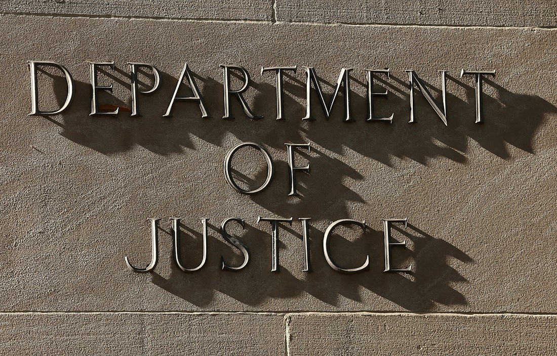 A sign for the U.S. Department of Justice in Washington is seen in this April 6, 2026, file photo. (OSV News photo/Kevin Lamarque, Reuters)