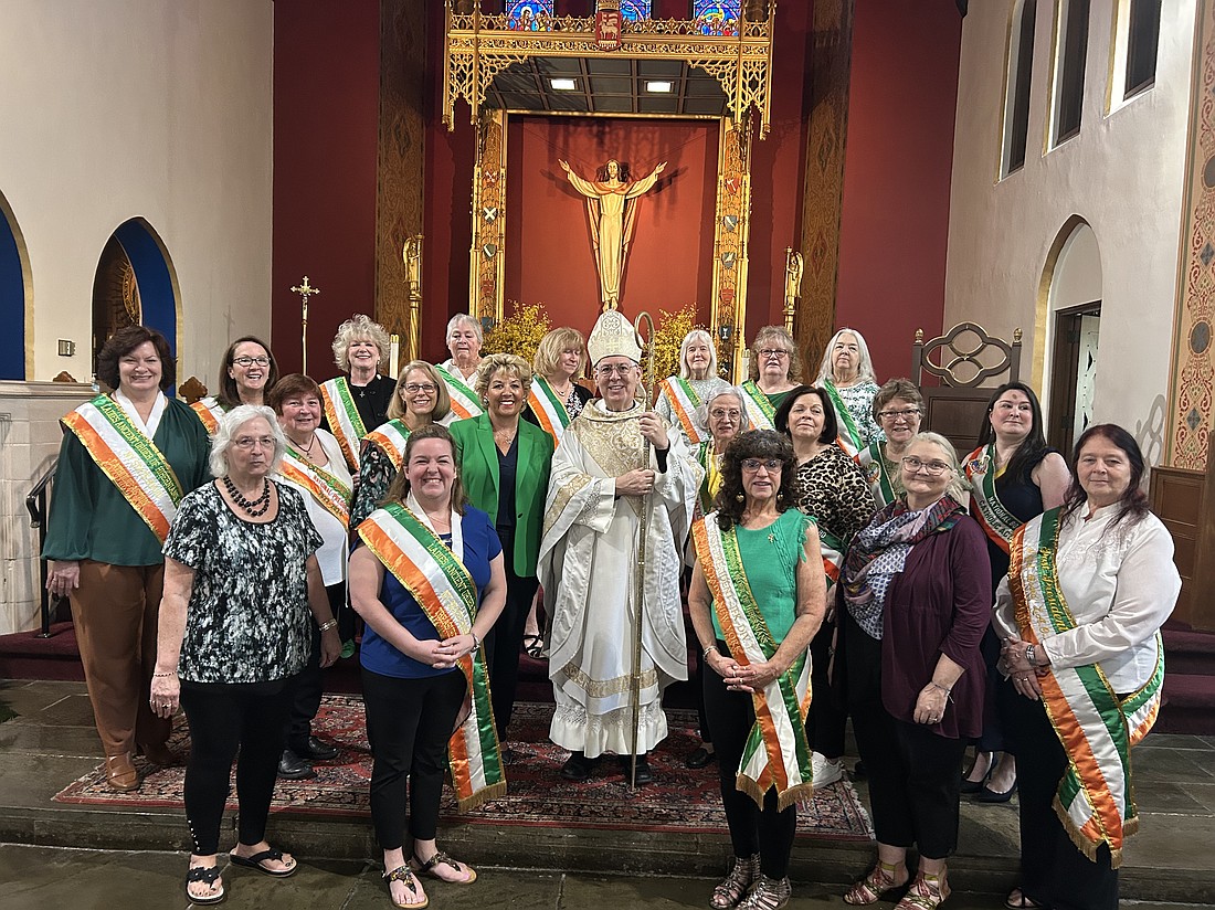 Members of the Schenectady Ladies Ancient Order of Hibernians, JFK Division 1, are shown after Mass with Bishop Mark O’Connell and Irish Ambassador to the United States Geraldine Byrne Nason (to Bishop Mark’s right) on April 18 at St. Luke’s in Schenectady. (Photo provided)