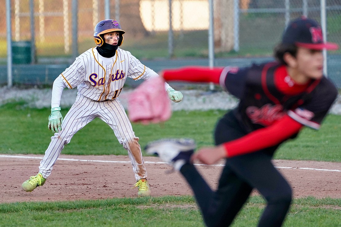 Spa Catholic’s Kingston David Jr. threatens to steal second as he leads off first base during the Saints' 12-0 win against Mechanicville on Friday, May 8, at Veteran’s Memorial Park in Saratoga Springs. (Cindy Schultz photo for The Evangelist)