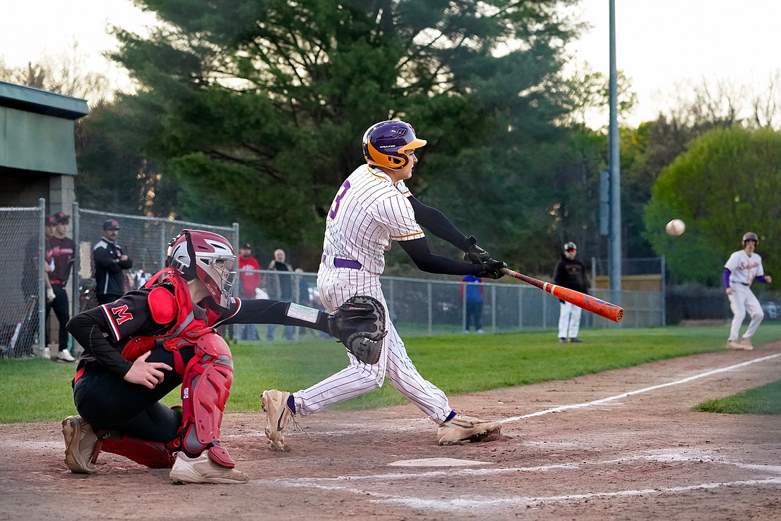 Spa Catholic’s Joey Lindner connects at bat during the Saints' 12-0 win against Mechanicville on Friday, May 8, at Veteran’s Memorial Park in Saratoga Springs. (Cindy Schultz photo for The Evangelist)