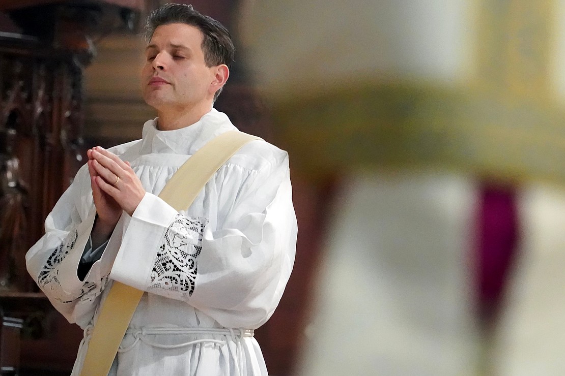 Candidate for the priesthood Alexander Turpin presents to Bishop Mark O’Connell during the Mass of Ordination to the Priesthood and the Diaconate on May 16 at the Cathedral of the Immaculate Conception in Albany. (Cindy Schultz photo for The Evangelist)