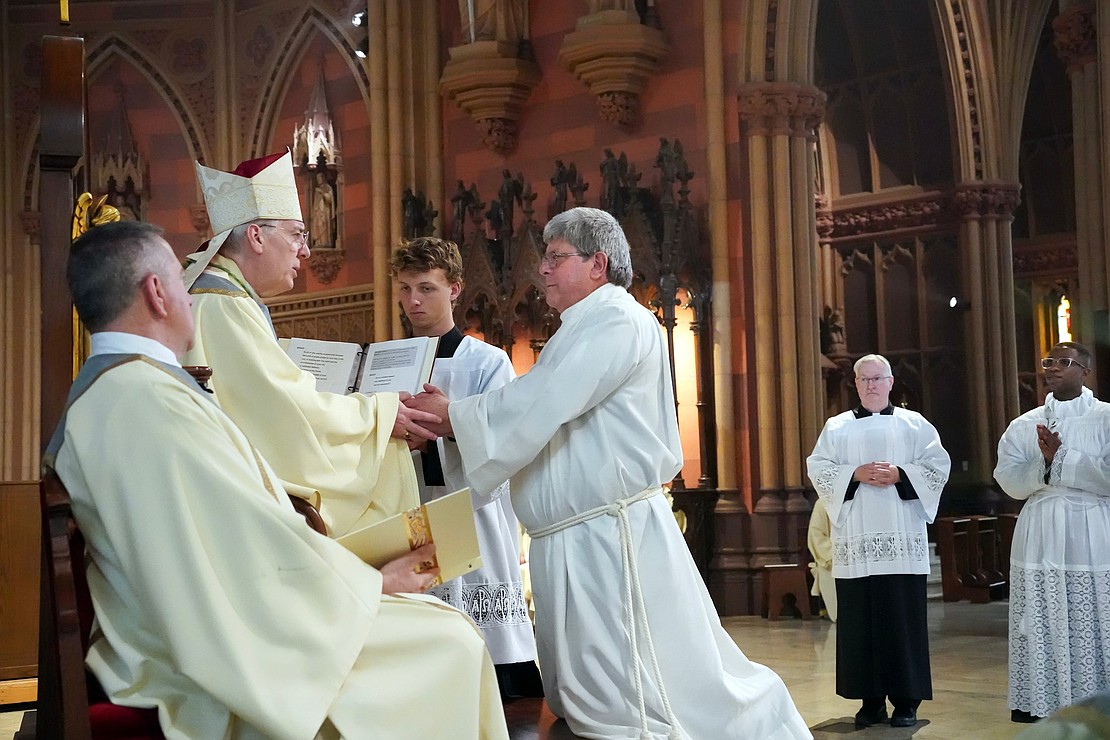 Candidate for deacon Timothy Kilpeck gives the promise of obedience to Bishop Mark O’Connell during the Mass of Ordination to the Priesthood and the Diaconate on May 16 at the Cathedral of the Immaculate Conception in Albany. (Cindy Schultz photo for The Evangelist)