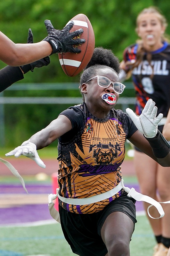 Holy Trinity’s Chelsea Johnson defends during the Pride's Section 2 Class C flag football final on May 22 at Christian Brothers Academy. (Cindy Schultz photo for The Evangelist)