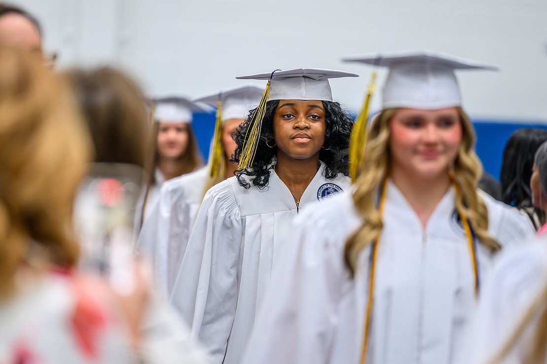Graduate Aba Amissah (c.) walks with her classmates into the auditorium at the start of the commencement exercises on May 22 at the Academy of the Holy Names in Albany. (Vincent Giordano photo for The Evangelist)