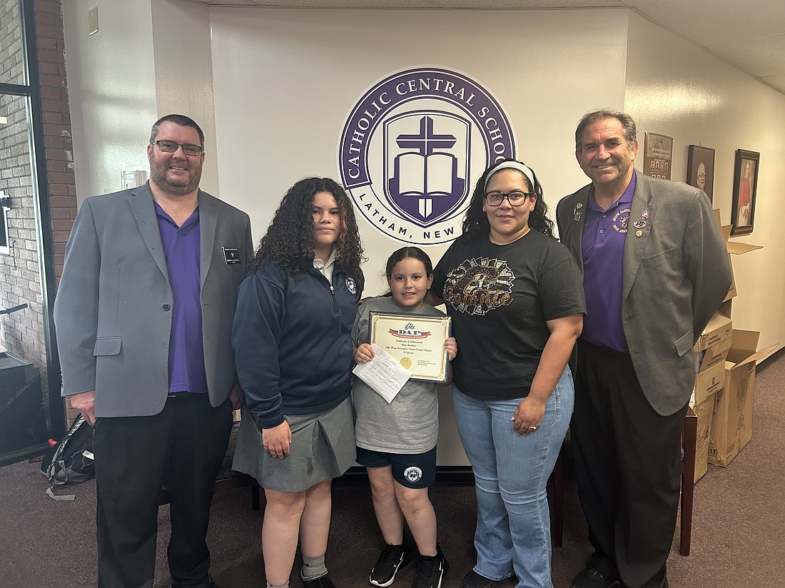 BRIA BOEHMER (c.) holds her certificate of achievement as having the best third grade poster in the state in the Elks Drug Awareness Poster Contest. Seen in the photo with Bria are (from l.) Gerry Stevens, a member of the Watervliet-Colonie Elks Lodge #1500 Drug Awareness Program and the State Capital District Elks #6480 Drug Awareness Program, Bria’s sister, Giselle, Bria’s mom, Sabrina McKay, and Bob Passonno, lodge chair of the Watervliet-Colonie Elks Lodge #1500 Drug Awareness Program and district chair of the State Capital District
Elks #6480 Drug Awareness Program. (Mike Matvey photo)