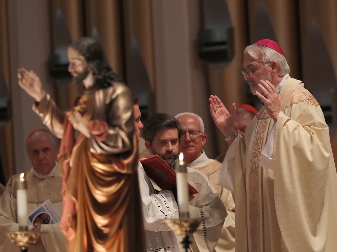 Archbishop Paul S. Coakley of Oklahoma City, president of the U.S. Conference of Catholic Bishops, concelebrates Mass as the bishops consecrate the country to the Sacred Heart of Jesus at the Basilica of Mary Queen of the Universe in Orlando, Fla., June 11, 2026, during their spring plenary assembly. (OSV News photo/Bob Roller).