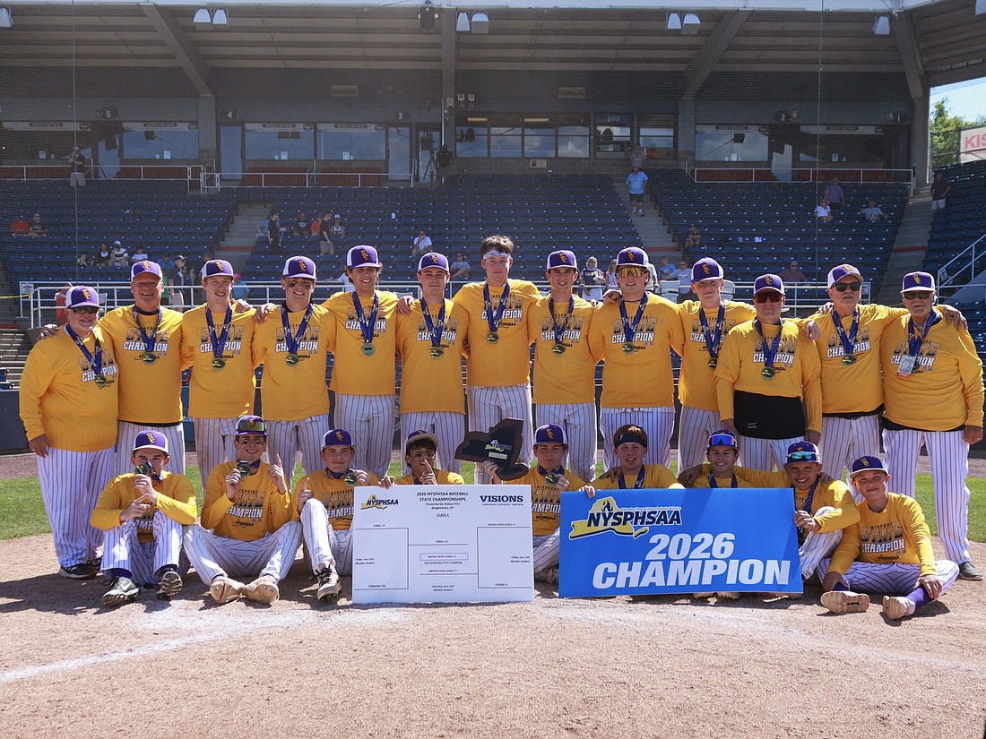 Saratoga Central Catholic baseball team is all smiles after winning their second-straight Class C state baseball title after a 4-1 win over Kendall on June 13 at Mirabito Stadium in Binghamton. (Photo courtesy of Sam Caron)