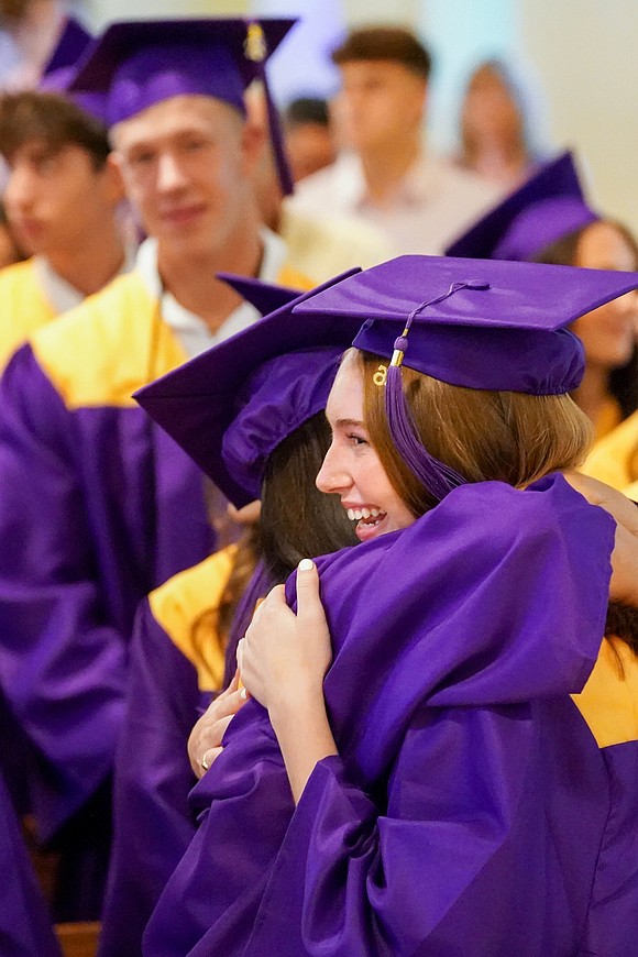 Graduate Ava Brown, who received the Sister Maureen Joyce Award for Social Justice, celebrates at the conclusion of Saratoga Catholic Central's commencement exercises on June 26 at St. Clement’s Church in Saratoga Springs. (Cindy Schultz photo for The Evangelist)