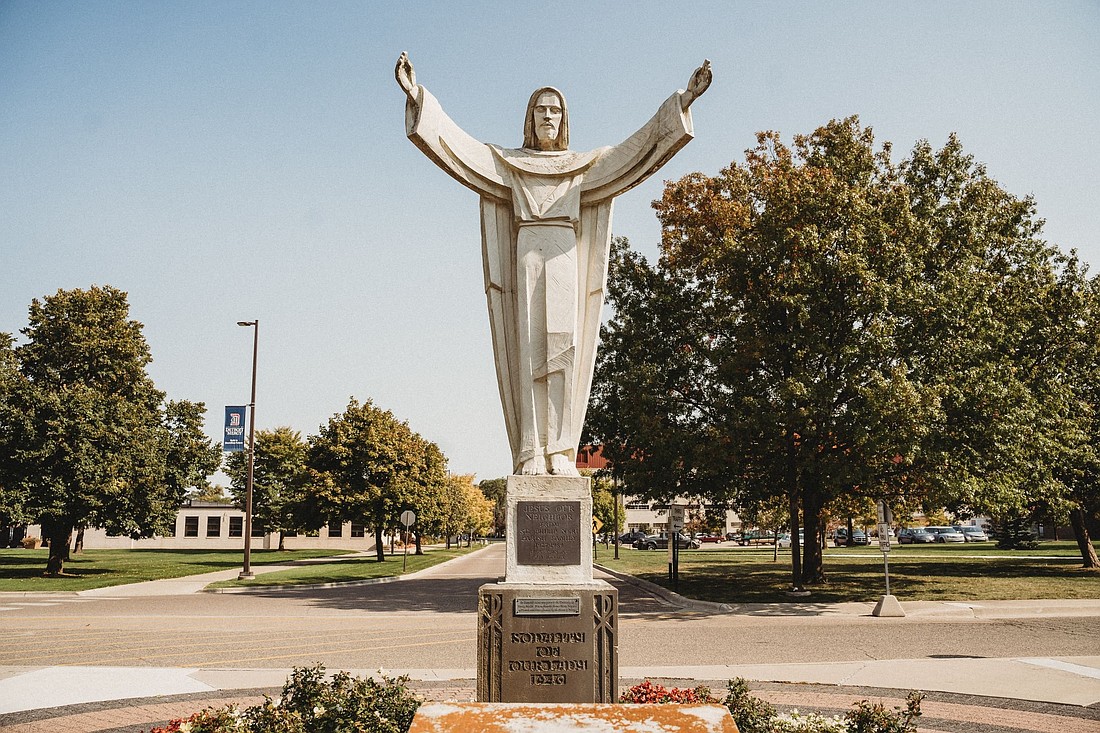 A statue of the risen Christ is pictured on the University of Detroit Mercy's McNichols campus in this undated photo. Starting in 2028, the Society of Jesus in the United States and Canada will combine its five novitiate programs in North America into two, with one of the new novitiates to be located at the University of Detroit Mercy's Lansing-Reilly Hall, the Jesuits' current residence on the campus. The other novitiate will be based in Culver City, California. (OSV News photo/Valaurian Waller, Detroit Catholic)