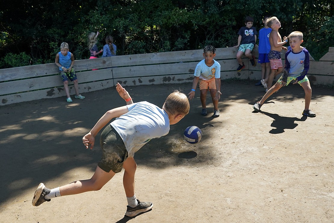 Campers play a game of Gaga inside of an enclosed space constructed for the sport on Aug. 4 at Camp Scully in Wynantskill. (Cindy Schultz photo for The Evangelist)