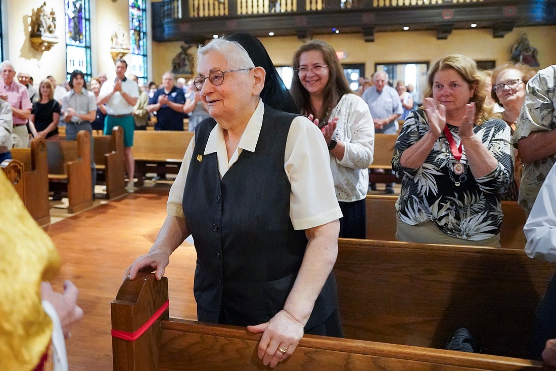 Sister Maria Rosa Querini, MPV, receives applause during a special Mass to celebrate her 90th birthday on Sunday, June 22, 2025, at St. Anthony’s Church in Schenectady. On Aug. 3 of this year, Sister Maria Rosa, a beloved member of the St. Anthony's community for nearly 60 years, died peacefully at Ellis Hospital. (Cindy Schultz photo for The Evangelist)