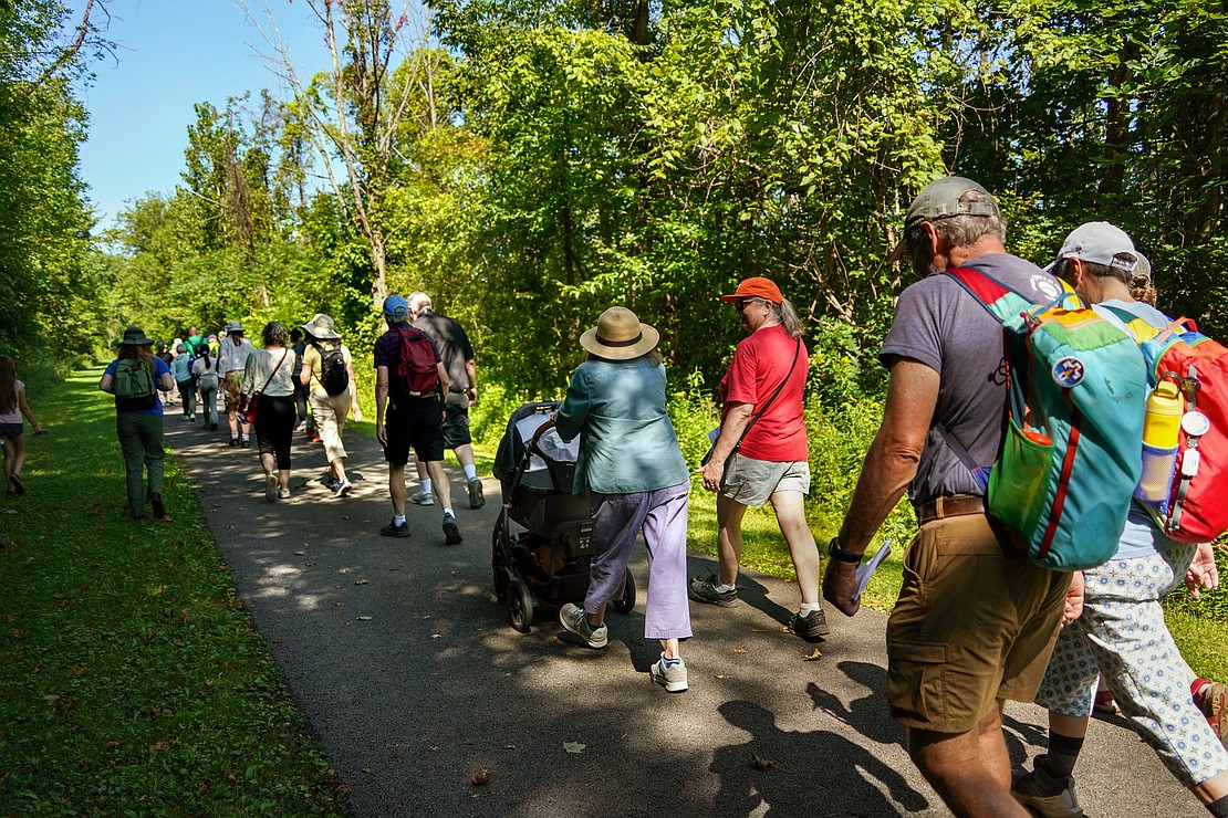 Participants walk along the Erie Canalway Trail during the Pilgrimage for Peace on Saturday, Aug. 22. The event started at the National Shrine of the North American Martyrs in Auriesville. Participants, praying the rosary and singing songs, walked six miles to the Saint Kateri Tekakwitha National Shrine and Historic Site in Fonda. (Cindy Schultz photo for The Evangelist)