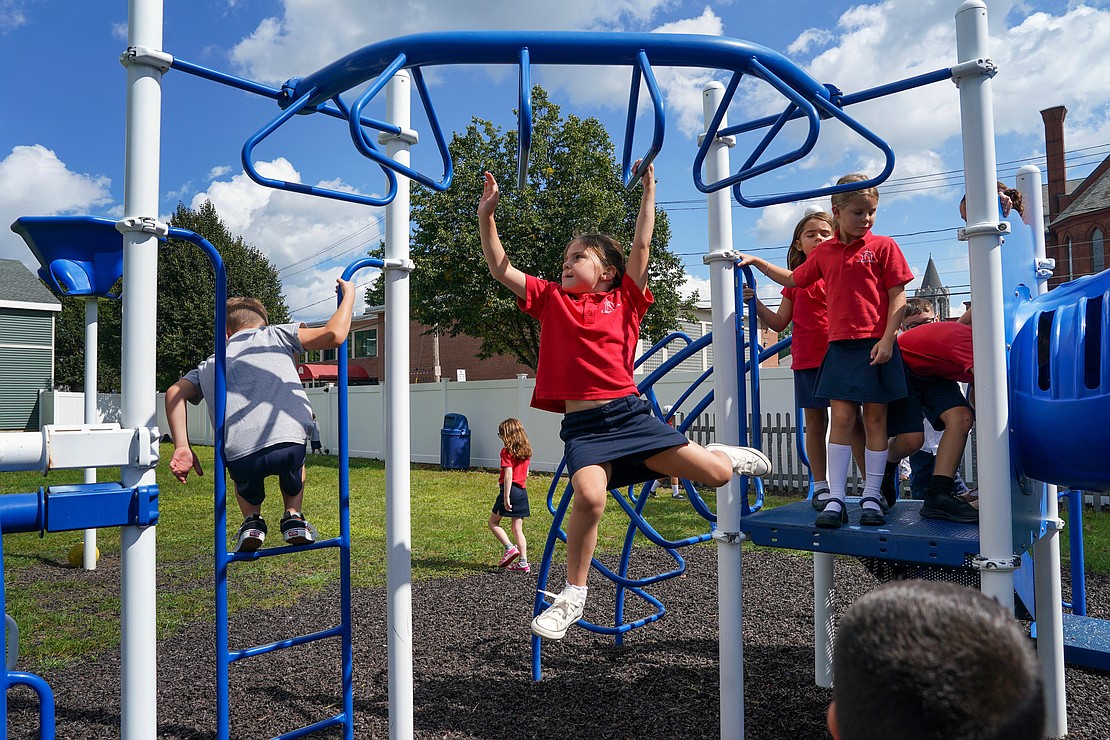 First- and second-grade students play on the jungle gym during recess on Sept. 10 at St. Mary’s School in Ballston Spa. (Cindy Schultz photo for The Evangelist)