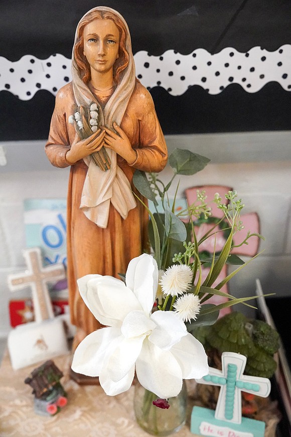 A statue of the Blessed Mothers and other religious symbols adorn a kindergarten class on Sept. 10 at St. Mary’s School in Ballston Spa. (Cindy Schultz photo for The Evangelist)