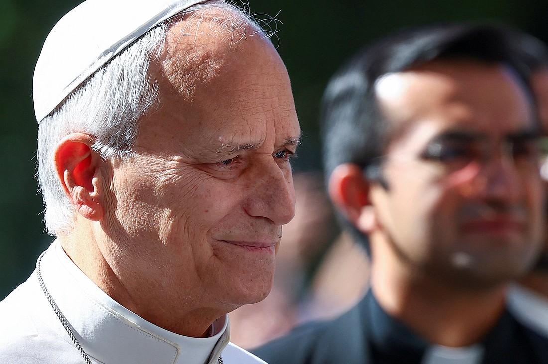 Pope Leo XIV smiles as he arrives at Rome's Gemelli Hospital Oct. 13, 2026, ahead of his surgery that afternoon to remove a lung nodule. (OSV News photo/Guglielmo Mangiapane, Reuters)