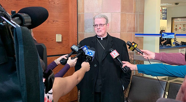 Bishop Edward B. Scharfenberger talks with the media in Albany after being named Apostolic Administrator of the Diocese of Buffalo on Dec. 4.  Mary DeTurris Poust photo