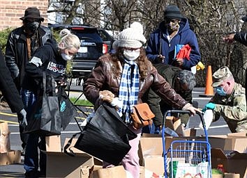 Catholic Charities plans four food drops in May in the Diocese