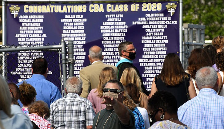 Scenes from Christian Brothers Academy’s graduation at the football stadium on Thursday.   The list of the 88 graduates.  (Photos by Michael P. Farrell)