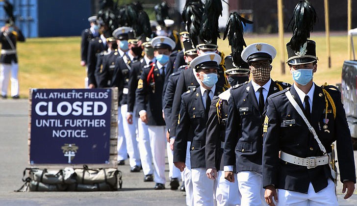 Scenes from Christian Brothers Academy’s graduation at the football stadium on Thursday in which 88 Cadets graduated.  The seniors march into the football stadium prior to the graduation ceremony.  (Photos by Michael P. Farrell)