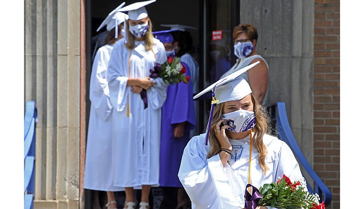 Catholic Central High School in Troy held its 97th Commencement Exercises on Saturday, July 25, under a tent at the athletic fields. The school graduated 40 seniors, including Valedictorian Paul Barber and Salutatorian Michael J. Paglia. Bishop Edward B. Scharfenberger presided and blessed the graduates.  Graduates proceed to the commencement.  Photos by Michael P. Farrell 