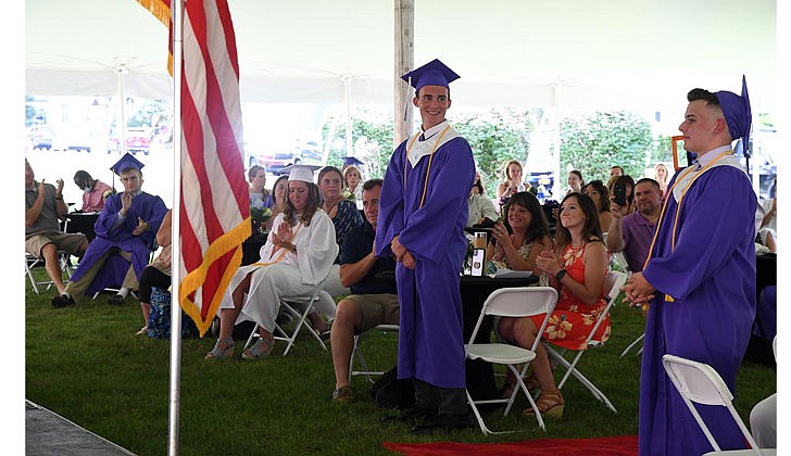 Catholic Central High School in Troy held its 97th Commencement Exercises on Saturday, July 25, under a tent at the athletic fields. The school graduated 40 seniors, including Valedictorian Paul Barber and Salutatorian Michael J. Paglia. Bishop Edward B. Scharfenberger presided and blessed the graduates.  Valedictorian Paul Kenneth Barber, l. and Salutatorian Michael Joseph Paglia stand to be recognized.  Photos by Michael P. Farrell 