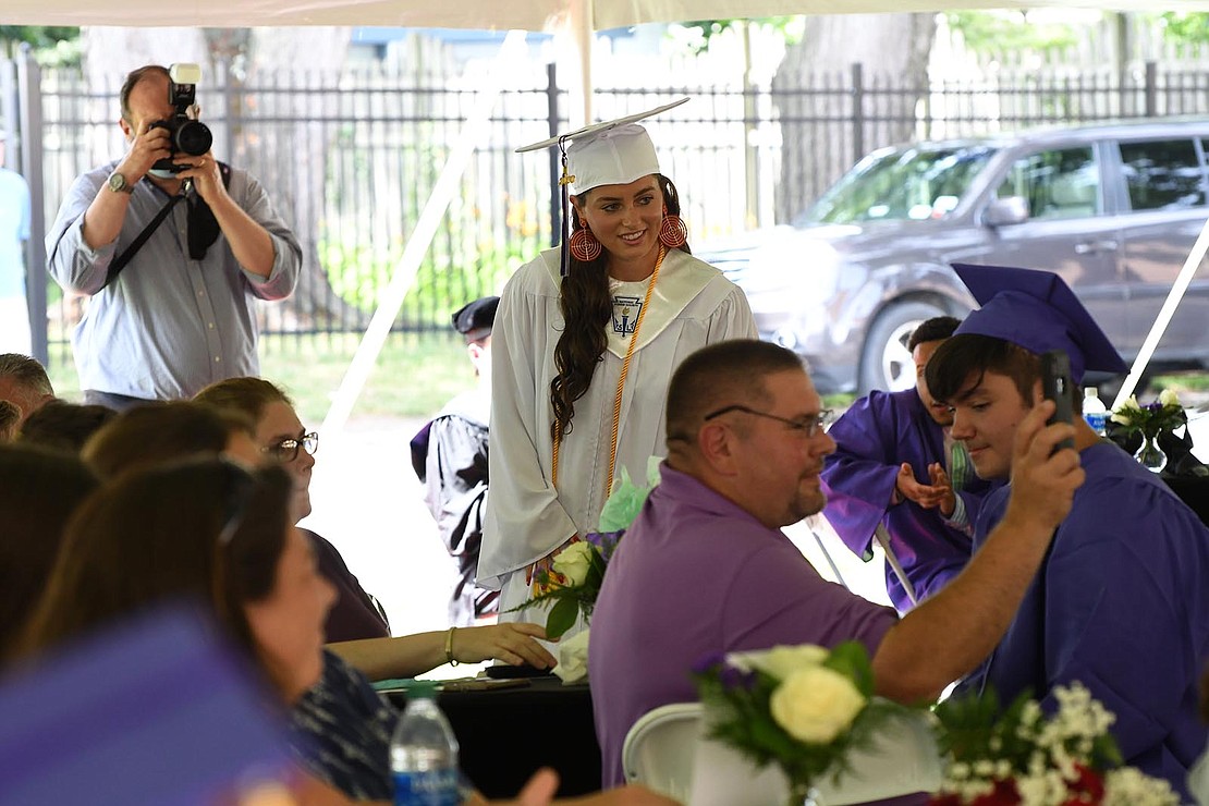 Catholic Central High School in Troy held its 97th Commencement Exercises on Saturday, July 25, under a tent at the athletic fields. The school graduated 40 seniors, including Valedictorian Paul Barber and Salutatorian Michael J. Paglia. Bishop Edward B. Scharfenberger presided and blessed the graduates.  Graduate Sophia McDonald, daughter of Assembly member John T. McDonald III, is recognized during the ceremony.  Photos by Michael P. Farrell 