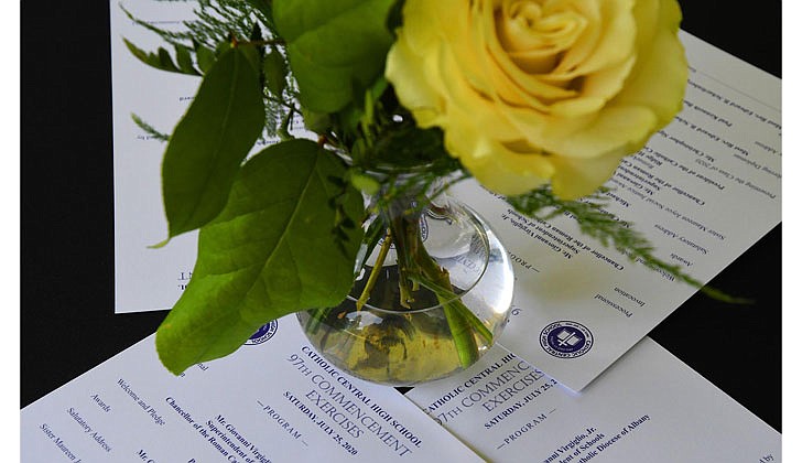 Catholic Central High School in Troy held its 97th Commencement Exercises on Saturday, July 25, under a tent at the athletic fields. The school graduated 40 seniors, including Valedictorian Paul Barber and Salutatorian Michael J. Paglia. Bishop Edward B. Scharfenberger presided and blessed the graduates.  Table settings are shown prior to the ceremony.  Photos by Michael P. Farrell 