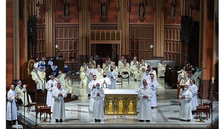 The combined Priesthood Ordination Rite and Diaconate Ordination Rite was celebrated by Bishop Edward B. Scharfenberger, with one man ordained to the priesthood and 13 men ordained to the Diaconate - eight men to the Permanent Diaconate and five men to the Transitional Diaconate - on Sept. 5 at the Cathedral of the Immaculate Conception in Albany.   The candidates for deacon receive cheers and applause as they are presented to the faithful, families and friends.  Photos by Cindy Schultz 