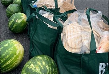 Catholic Charities hosting food drop today!