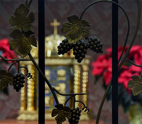 St. Anthony’s Church in Schenectady restoration includes a Eucharistic reservation chapel with a movable wrought-iron screen decorated with gilded Eucharistic symbols, wheat and grapes. (Cindy Schultz photos)