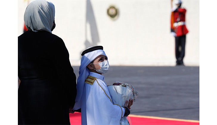 Pope Francis arrived in Baghdad, Iraq on Friday for his historic four-day visit to the Middle East nation. It is the first time a pope has ever visited Iraq and Pope Francis’ first foreign trip in 15 months because of the COVID-19 pandemic. The visit was to promote peace, tolerance and equality in the troubled nation.   Caption: A boy holds flowers as he attends a welcoming ceremony for Pope Francis at the presidential palace in Baghdad. (CNS photo/Paul Haring)