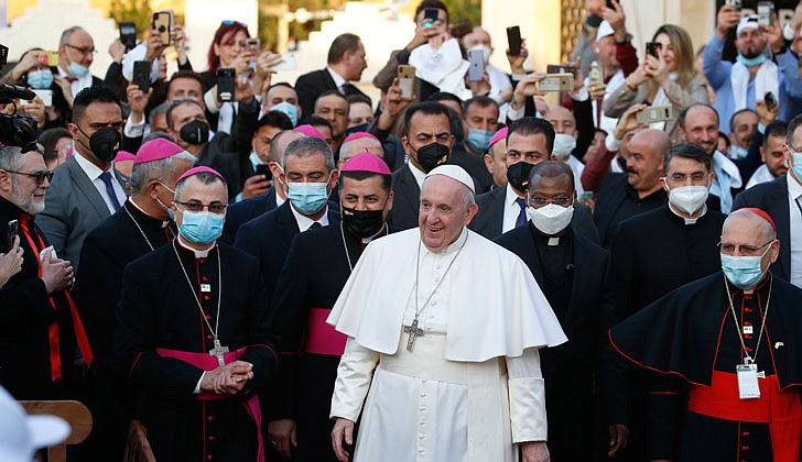 Pope Francis smiles as he arrives to celebrate Mass at St. Joseph Chaldean Catholic Cathedral in Baghdad March 6, 2021. (CNS photo/Paul Haring)