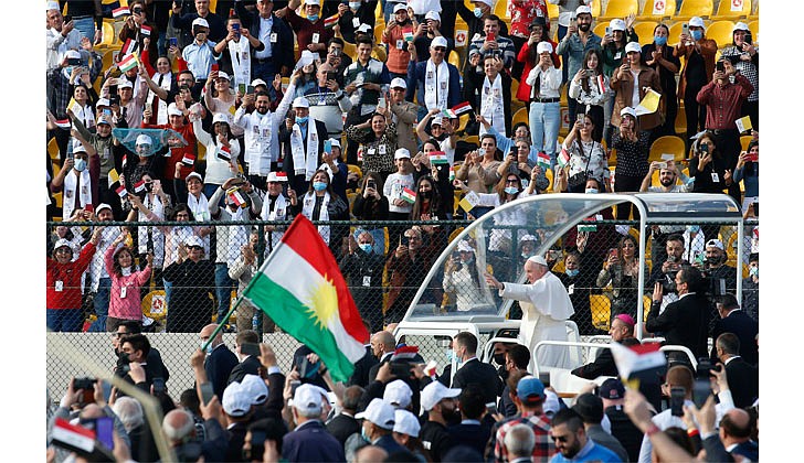 Pope Francis greets the crowd as he arrives to celebrate Mass at Franso Hariri Stadium in Irbil, Iraq, March 7, 2021. (CNS photo/Vatican Media)