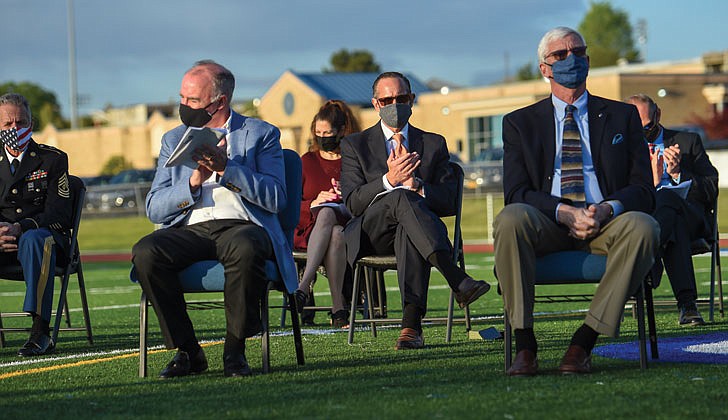 La Salle Institute in Troy held its graduation ceremony for its senior class on May 14 at its turf field. Dr. Chris Gibson, president of Siena College, decorated Army officer and a former member of the U.S. House of Representatives, was the keynote speaker. The 60 members of the class of 2021 were collectively accepted to 117 colleges and universities in 21 states and the District of Columbia and earned 163 scholarships totaling more than $11.9 million over four years. To remain compliant and adhering to all CDC and NYS guidelines, attendance was invite-only and the ceremony was livestreamed to accommodate those unable to attend in person.   Caption: Teachers applaud the graduates during commencement exercises.  Cindy Schultz photos  