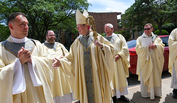 Deacons Matthew Duclos, Kyle Gorenski, Daniel McHale, Nathaniel Resila and Stephen Yusko were ordained into the priesthood at the Cathedral of the Immaculate Conception in Albany by Bishop Edward B. Scharfenberger on June 19.   Bishop Edward B. Scharfenberger greets diocesan priests after the Mass.  Photos by Cindy Schultz  