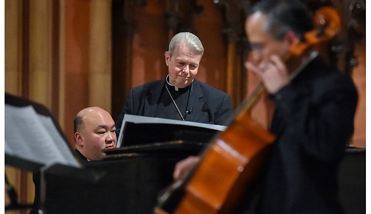 The Diocese of Albany held its seventh annual Concert for Vocations at the Cathedral of the Immaculate Conception in Albany on Aug. 3. Following Holy Hour and Benediction, Bishop Edward B. Scharfenberger, along with priests, deacons, religious discerners and laity, performed during the concert which mixed classic and contemporary music. Bishop Scharfenberger performed “The Impossible Dream” from Man of La Mancha as well as "Fratello Sole, Sorella Luna" (Brother Sun, Sister Moon). To watch the concert, head to rcda.org.  Caption: Bishop Edward B. Scharfenberger confers with his accompanist Father Quy Vo before performing “Fratello Sole, Sorella Luna.”  Photos by Cindy Schultz 