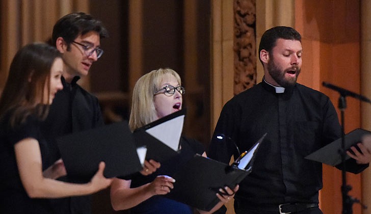 The Diocese of Albany held its seventh annual Concert for Vocations at the Cathedral of the Immaculate Conception in Albany on Aug. 3. Following Holy Hour and Benediction, Bishop Edward B. Scharfenberger, along with priests, deacons, religious discerners and laity, performed during the concert which mixed classic and contemporary music. Bishop Scharfenberger performed “The Impossible Dream” from Man of La Mancha as well as "Fratello Sole, Sorella Luna" (Brother Sun, Sister Moon). To watch the concert, head to rcda.org.  Caption: Father Daniel Quinn (from r.) joins Andrea Reno, Timothy Reno and Ann Marie Adamick in singing The Lord’s Prayer.”  Photos by Cindy Schultz 