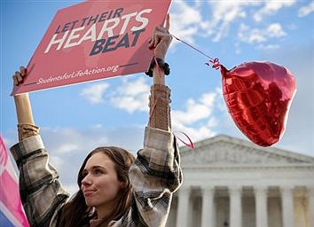 Court keeps Texas abortion law in place, allows challenge to continue  