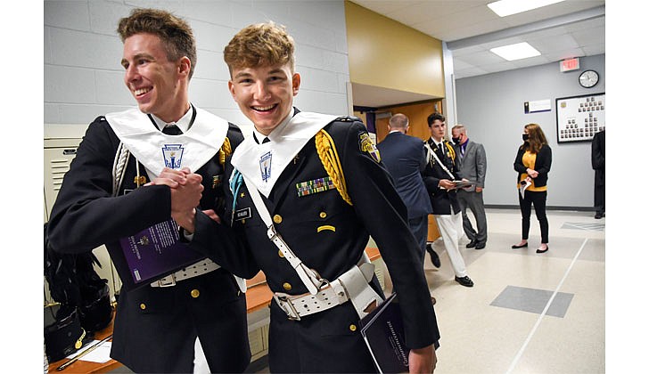 Graduates Ethan Connolly (l.) and Gregory Beaulieu Jr. celebrate their achievement following commencement exercises on June 4 at Christian Brothers Academy in Colonie. (Cindy Schultz for The Evangelist)