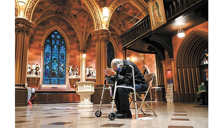 Robert Egan, of Albany, prays during a special liturgy to mark the start of the worldwide synod on Oct. 25 at the Cathedral of the Immaculate Conception in Albany. (Cindy Schultz for The Evangelist)