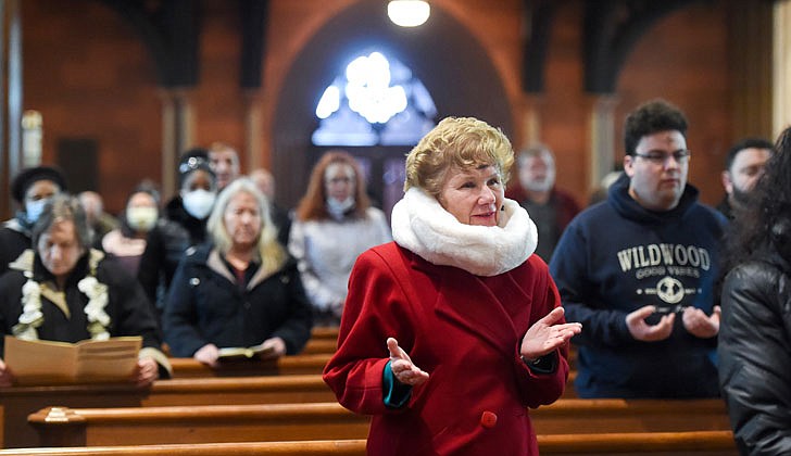 Parishes throughout the Diocese of Albany observed Ash Wednesday, March 2, as “A Day of Prayer and Fasting for Peace in Ukraine,” as requested by Pope Francis. Ash Wednesday marks the start of Lent, beginning a period of prayer and fasting, culminating with Holy Week and Easter Sunday, April 17. Bishop Edward B. Scharfenberger celebrated Mass and distributed ashes at the Cathedral of the Immaculate Conception that day. Bishop Scharfenberger continues to urge Catholics to support emergency relief for Ukraine as the humanitarian crisis grows. Catholic Relief Services is working with its partner, Caritas Ukraine, to respond. Use this link to help:https://bit.ly/3hbagDJ. The Knights of Columbus also have established the Ukraine Solidarity Fund and you can donate at: kofc.org/secure/en/donate/ukraine.html.  In the photo: Susan Richardson of Cohoes (c.) prays during Mass.  Cindy Schultz photo for The Evangelist.