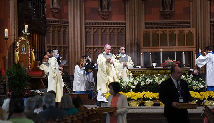 Bishop Edward B. Scharfenberger celebrated Easter Sunday Mass at the Cathedral of the Immaculate Conception in Albay on April 17. Here is a pictorial look back!  Caption: Bishop Scharfenberger presides over Easter Mass at the Cathedral.  Photos by Cindy Schultz