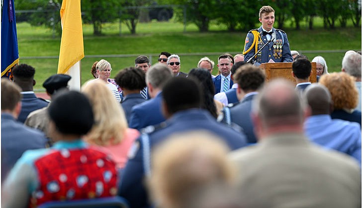 La Salle Institute honored its graduating class of 2022 — the last all-male class — with a formal, in-person commencement ceremony May 14 on the school’s athletic field. The ceremony featured John Thero ’79, former president and CEO of Amarin Corporation, as guest speaker. “I am exceptionally proud of this group of young men. They have conquered challenges and persevered despite unprecedented challenges, and they have proven to be extraordinary,” said La Salle Institute President and Head of School Joseph Raczkowski ’72. “They will attend college this fall at Notre Dame, Cornell University, UNC-Chapel Hill and The Citadel, to name a few. 18 young men will continue their athletic careers in college, including four at the Division 1 level. To say I am proud is an understatement, and I have no doubt they will go on to have great success in college and life.” Members of the class of 2022 were accepted to 141 colleges and universities in 28 states and the District of Columbia and earned more than $12.4 million in scholarships. In October 2020, La Salle announced its Mission Expansion Initiative, a shift to a co-educational model which began in September 2021.  Valedictorian Anthony Bruno addresses fellow graduates.  Cindy Schultz photos for The Evangelist