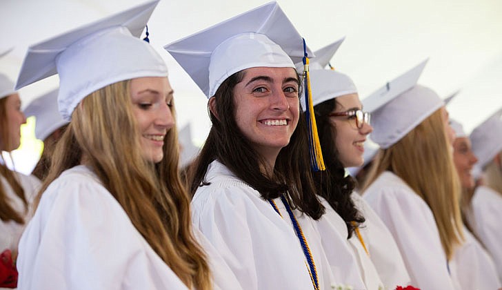 The Academy of the Holy Names celebrated its 133rd commencement ceremony on May 27 with Bishop Edward B. Scharfenberger presiding. 100 percent of the 44 graduating seniors were accepted into colleges and universities which included Cornell, Dartmouth, Fordham, Holy Cross, Villanova and Notre Dame. They also received a total $18.4 million in merit-based scholarships. Over the last four years, the seniors also performed 2,485 hours of community service.  Graduate Mary Jordan is all smiles.  Patrick Dodson photos for The Evangelist