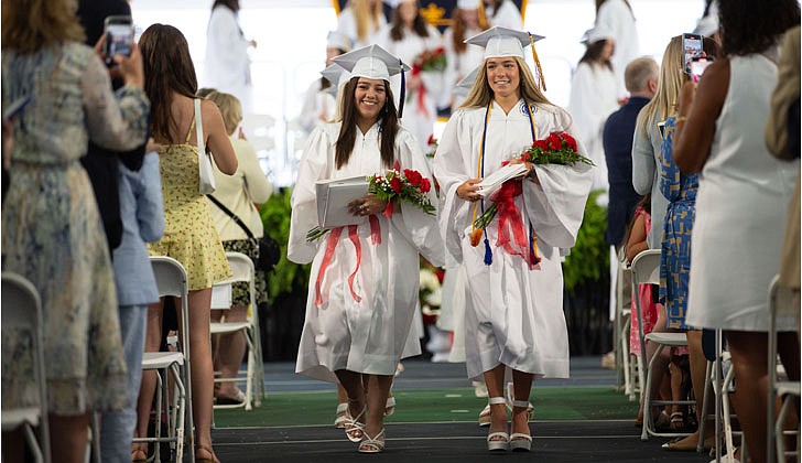 The Academy of the Holy Names celebrated its 133rd commencement ceremony on May 27 with Bishop Edward B. Scharfenberger presiding. 100 percent of the 44 graduating seniors were accepted into colleges and universities which included Cornell, Dartmouth, Fordham, Holy Cross, Villanova and Notre Dame. They also received a total $18.4 million in merit-based scholarships. Over the last four years, the seniors also performed 2,485 hours of community service.  The graduates proceed out after commencement.  Patrick Dodson photos for The Evangelist)