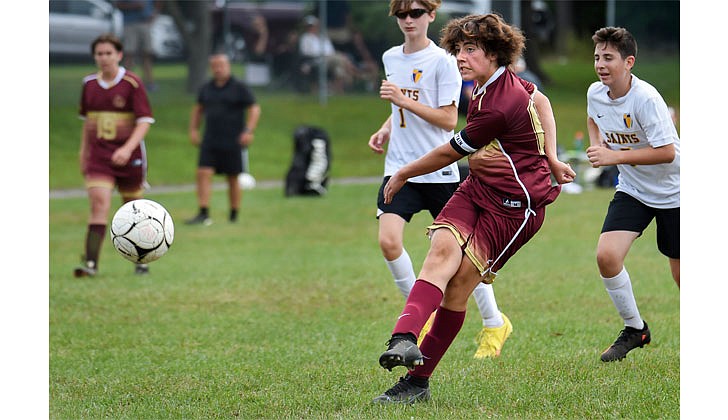 Notre Dame-Bishop Gibbons School’s Nicholas Kuban scores during his team’s soccer game against Saratoga Central Catholic School on Sept. 3 in Schenectady. Kuban, the team captain, scored twice and NDBG won 2-0. (Cindy Schultz photo for The Evangelist)