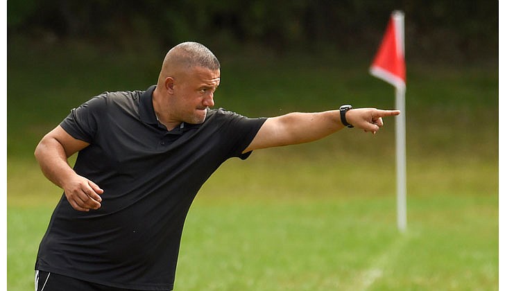 NDBG coach Frank DiMeo makes sure his team gets the point during its 2-0 over SCC on Sept. 3. (Cindy Schultz photo for The Evangelist)