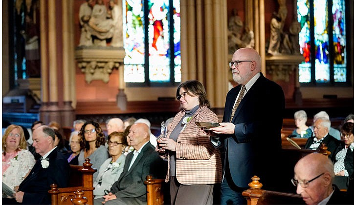 The 50th Annual Diocesan Marriage Jubilee Celebration, sponsored by the Office of Lay Ministry and Parish Faith Formation, was held at the Cathedral of the Immaculate Conception in Albany on Oct. 8.  Mary and Brian Fay, celebrating their 35th anniversary, are the gift bearers during the Mass. Mary Fay is the associate director for Marriage Formation Ministry and Family Life Coordinator of Pastoral Care Ministries for the Diocese of Albany.  Photos by Cindy Schultz for The Evangelist 